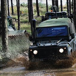 Members of 131 Commando Squadron conducting an engineering training exercise with Land Rovers.